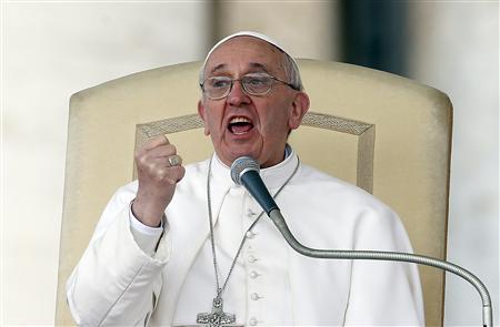 Pope Francis gestures as he speaks during a weekly general audience in Saint Peter's Basilica, at the Vatican