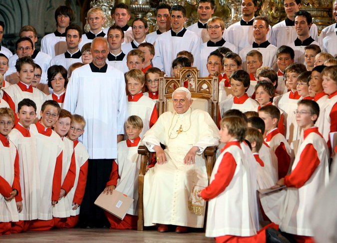 Pope Benedict XVI with the Regensburg choir in Bavaria in 2006. The former pope’s brother conducted the choir from 1964 to 1994, a period that coincides with accusations of abuse.