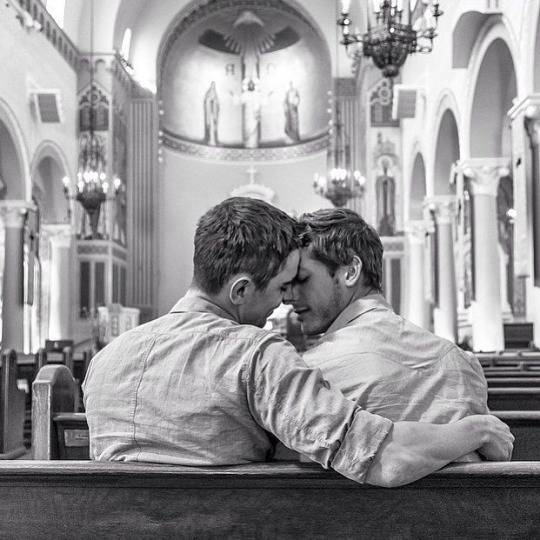 men-kissing-in-church